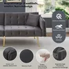 A close-up view of a gray sofa with gold legs, featuring descriptive text and icons highlighting its features. Produktbild-Vorschau