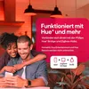 A couple looking at a phone with a pink overlay describing product features. Produktbild-Vorschau