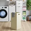 A laundry room scene with a washing machine, storage cabinets, and a laundry basket. Anteprima dell’immagine prodotto