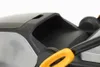 A close-up view of the top section of a lawnmower, focusing on the handle and a ventilation grille. Produktbild-Vorschau