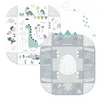 Two cartoon-style playmats with dinosaur themes are shown against a white background. One mat features various dinosaurs and jungle elements, while the other is designed to look like a friendly dinosaur face with a rainbow pattern. Anteprima dell’immagine prodotto