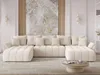 A modern living room with a large U-shaped sofa.
