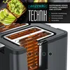 A close-up, cutaway view of a toaster, highlighting its internal components and features, with a small inset image of avocado toast at the top. Produktbild-Vorschau