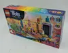 The image shows the front and side of a LEGO Trolls World Tour playset box, featuring colorful graphics and characters from the movie. Náhled obrázku produktu