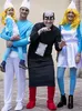 A family dressed as Smurfs and Gargamel for a costume event. Produktbild-Vorschau
