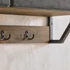 Detail der schwarzen Haken und Metallhalterung der SoBuy Wandgarderobe FHK26-N Anteprima dell’immagine prodotto