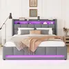 A bedroom scene featuring a gray upholstered bed with integrated LED lighting. Náhľad obrázku produktu
