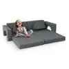 A young girl is sitting on a gray modular sofa designed for children. Náhled obrázku produktu
