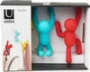 The image shows a retail package containing three Umbra Buddy wall hooks in different colors. Anteprima dell’immagine prodotto