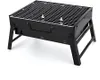A black, foldable charcoal grill with a metal grate, shown from a slightly elevated front-left angle against a white background. Náhled obrázku produktu
