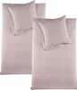 Two sets of bedding, each with a duvet cover and a pillowcase, are laid out flat on a white background. Produktbild-Vorschau
