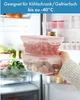 Two food storage containers are being held in front of an open refrigerator. Produktbild-Vorschau
