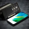 A black leather wallet case for a smartphone is open, showing cards and a banknote inside, with the smartphone screen displaying a colorful abstract image. Produktbild-Vorschau