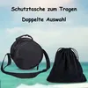 Two black bags are shown against a blurred background of the sky and sea. Produktbild-Vorschau