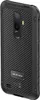 The back of a black Ulefone Armor X8 smartphone with a carbon fiber pattern. Produktbild-Vorschau