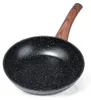 A black frying pan with a speckled interior and a wooden handle, isolated on a white background. Produktbild-Vorschau