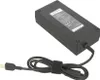A black laptop power adapter with a coiled cable and a yellow-tipped connector, shown on a white background. Náhľad obrázku produktu