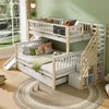 A children's bunk bed with a slide and stairs, decorated with pillows and a chalkboard. Náhled obrázku produktu