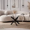 A modern living room scene with a sofa, coffee table, and artwork. Produktbild-Vorschau
