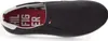 A top-down view of a black slip-on sneaker with white trim and a red insole featuring the Tommy Hilfiger logo. Náhled obrázku produktu