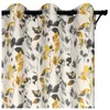A close-up view of a curtain with a floral pattern. Produktbild-Vorschau