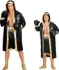 Two people, an adult male and a child, are posing in boxing champion costumes. Produktbild-Vorschau
