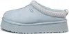 A single light blue UGG slipper shown from the side on a white background. Produktbild-Vorschau