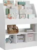 A white bookshelf filled with children's books and toys. Produktbild-Vorschau