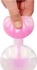 A hand is holding a pink cap over a clear bottle with pink glitter liquid inside. Voir les images du produit