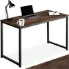 A desk with a laptop, mug, and lamp. Náhled obrázku produktu