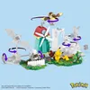 A construction toy set depicting a farm scene with various Pokemon figures and a windmill. Voir les images du produit