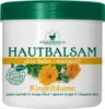 A white tub of skin balm with green and yellow labeling, featuring images of marigold flowers. Náhľad obrázku produktu