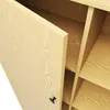 Close-up view of an open wooden cabinet with visible shelves and a black knob on the door. Produktbild-Vorschau