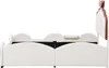 A side view of a white children's bed with a brown decorative element at the headboard. Podgląd zdjęcia produktu