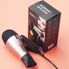 A hairdryer and its packaging are displayed on a pink background. Produktbild-Vorschau