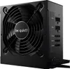 A black computer power supply unit (PSU) with a large fan on the front and modular connectors on the side. Podgląd zdjęcia produktu