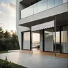 A modern house with a patio and a retractable awning. Náhled obrázku produktu