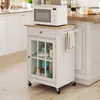 A white kitchen cart with a wooden top is shown in a kitchen setting. Podgląd zdjęcia produktu