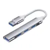 A silver USB hub with four ports and a white cable, shown against a white background. Produktbild-Vorschau