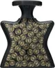 A black perfume bottle with a repeating gold circular pattern. Náhled obrázku produktu