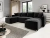 A modern living room with a large black sectional sofa as the main focus. Náhled obrázku produktu