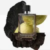 A bottle of Terre D'hermès Parfum Intense Eau de Parfum is displayed with natural elements like wood and citrus fruits. Anteprima dell’immagine prodotto
