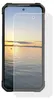 A screen protector is placed over a smartphone displaying a sunset over water. Náhľad obrázku produktu