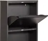 A close-up view of a black metal shoe cabinet with one of its doors open. Anteprima dell’immagine prodotto