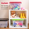 A white shelving unit displaying various storage boxes and toys. Produktbild-Vorschau