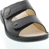 A black leather sandal on a white background. Produktbild-Vorschau
