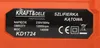 A close-up of a product label on an orange device. Náhled obrázku produktu
