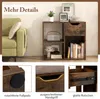 A living room scene with a couch and a wooden shelf unit. Podgląd zdjęcia produktu