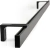 A black curtain rail system with wall brackets, shown from a low angle against a white background. Anteprima dell’immagine prodotto