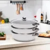 A stack of three white steaming pots with glass lids and silver handles, placed on a kitchen counter. Náhľad obrázku produktu